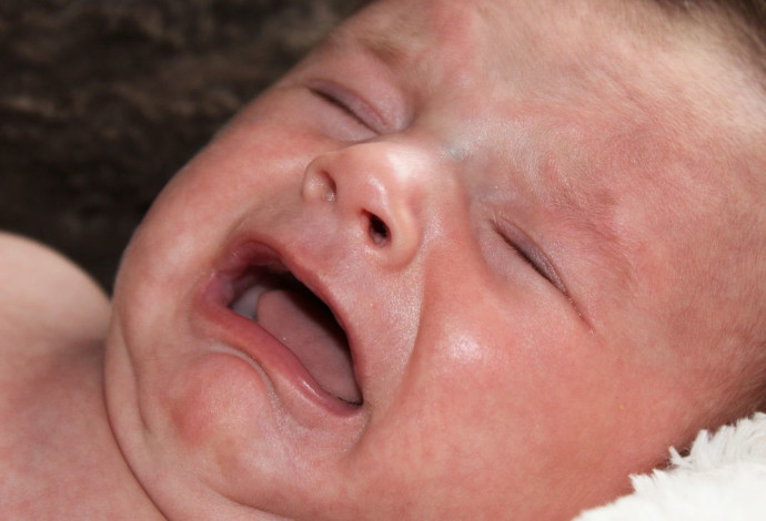 אליוסטרציה: תינוק בוכה (צילום:  אינג אימג')