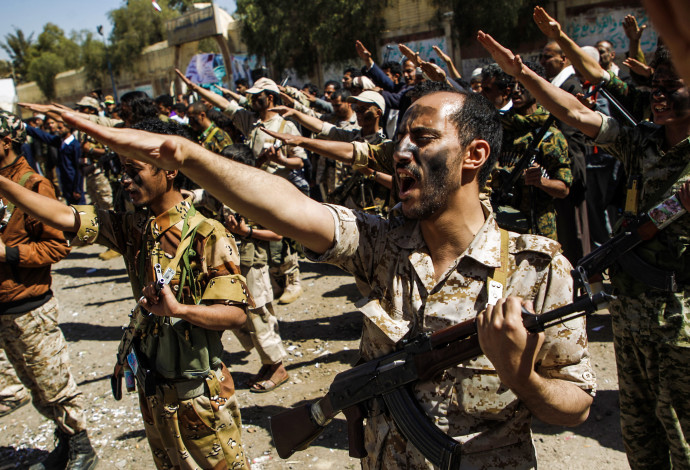 לוחמים חות'ים (צילום:  AFP)