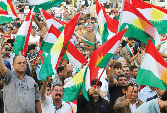 כורדים בכירכוכ מביעים תמיכה במשאל העם (צילום:  רויטרס)