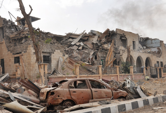 הנזק בדיר א-זור לאחר כיבושה ע"י צבא סוריה (ארכיון) (צילום:  AFP)