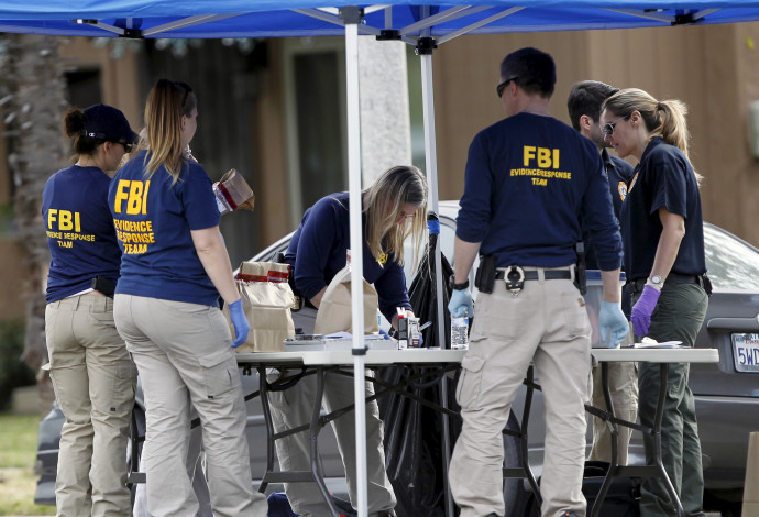 סוכני FBI (צילום:  רויטרס)
