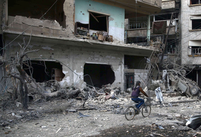 הפצצות באל-גוטה שבפרברי דמשק (צילום:  רויטרס)