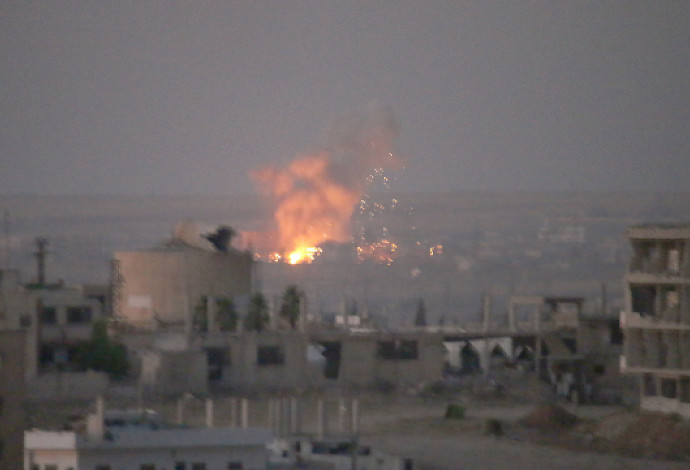 הפצצות בדרעא (צילום:  AFP)