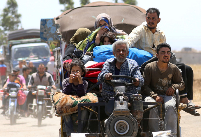 פליטים ממחוז דרעא (צילום:  רויטרס)
