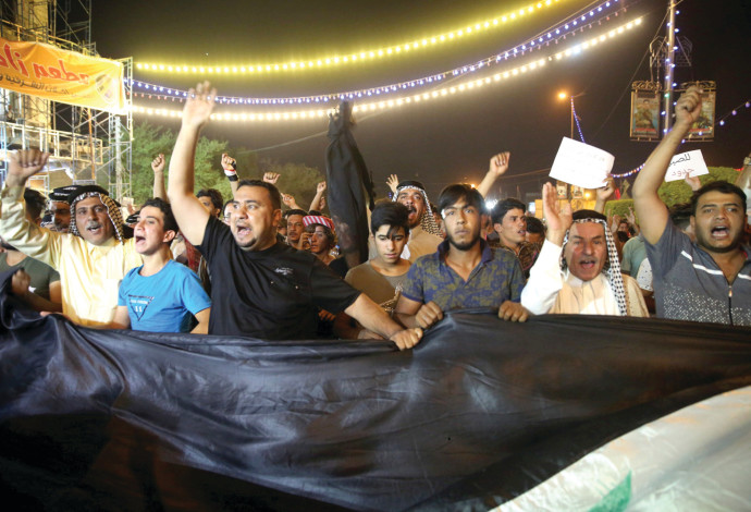 הפגנות בדרום עיראק (צילום:  רויטרס)