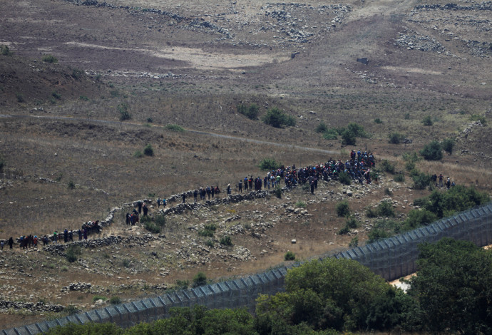 פליטים סורים בגבול עם ישראל (צילום:  רויטרס)