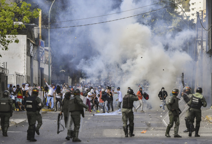 עימותים בוונצואלה (צילום:  AFP)