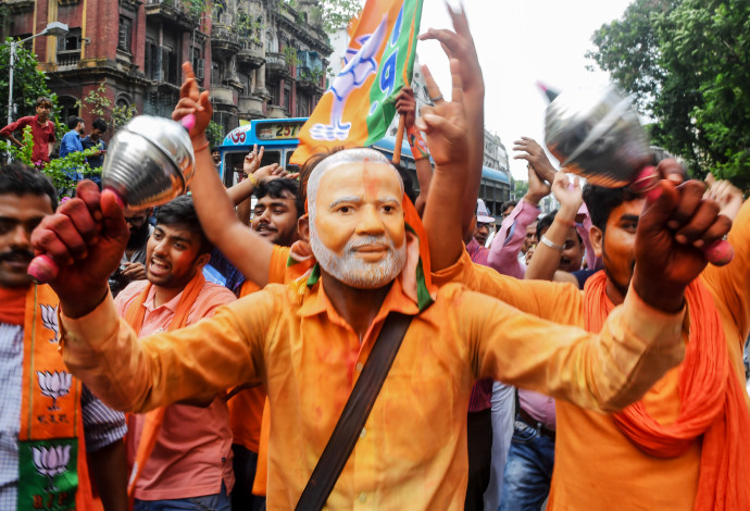 חגיגות הניצחון של מודי בהודו (צילום:  AFP)