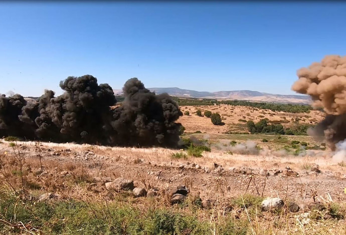 פיצוץ מוקשים ברמת הגולן (צילום:  דוברות משרד הביטחון וחברת iMAG)
