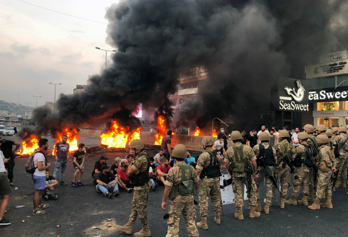 המחאה בלבנון (צילום:  REUTERS/Imad Creidi)