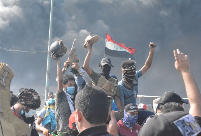 הפגנות בעיראק (צילום:  רויטרס)