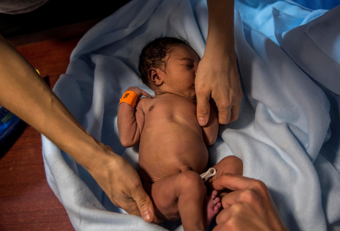 תינוק (צילום:  OLMO CALVO/Getty images)