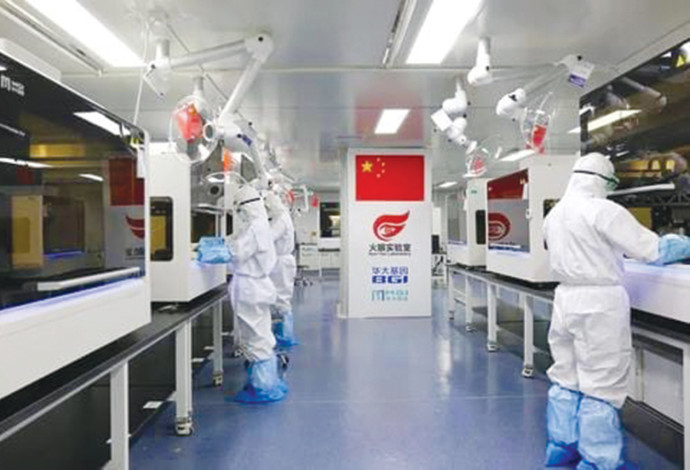 קורונה: מעבדת BGI בסין, המסוגלת לספק 20 אלף תוצאות בדיקות ביממה (צילום:  BGI)