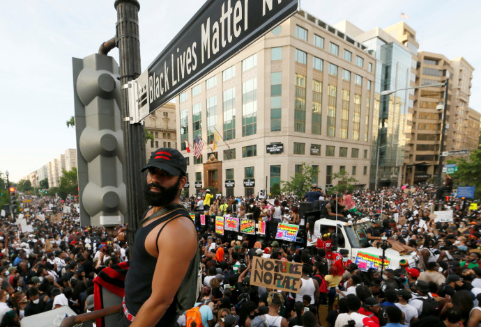 המחאה בארה"ב: הפגנה המונית בוושינגטון  (צילום:  REUTERS/Jim Bourg)