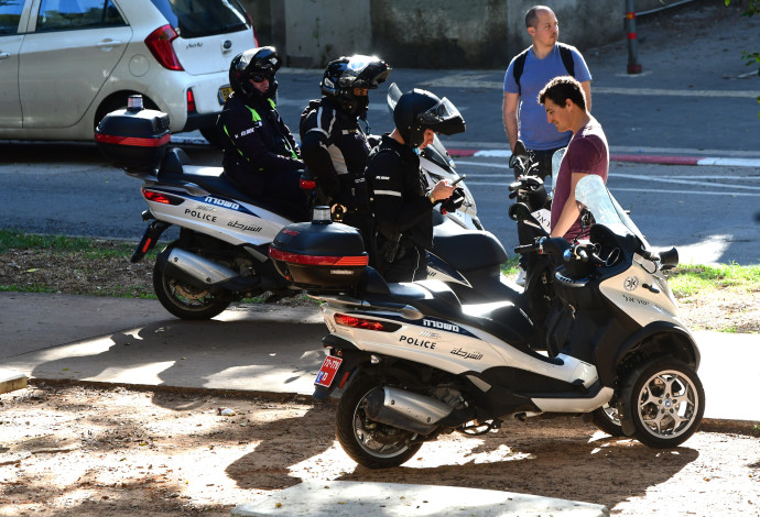 קורונה בישראל: דוחות על אי עטיית מסכות בתל אביב (צילום:  אבשלום ששוני)