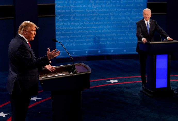 דונלד טראמפ וג'ו ביידן בעימות השני בנאשוויל (צילום:  Morry Gash/Pool via REUTERS)