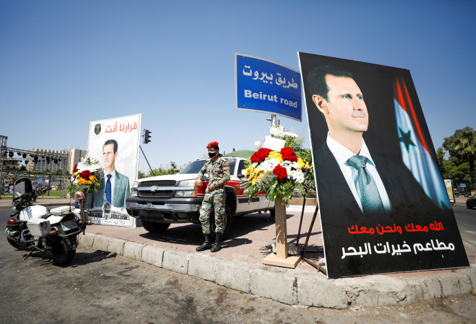 יום הבחירות לנשיאות סוריה, מפגן תמיכה בבשאר אסד (צילום:  REUTERS/Omar Sanadiki)