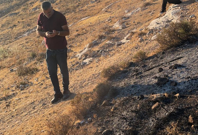 מעצר פעילי "בצלם" בעקבות הצתת שטחים ישראליים (צילום:  אם תרצו)