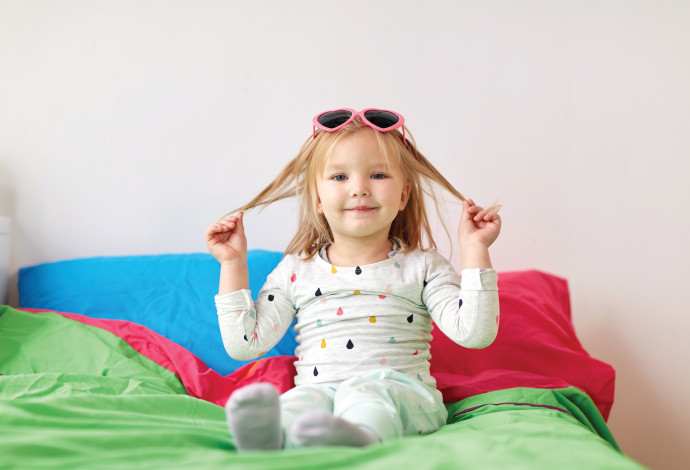 כיצד להעביר בת שנתיים למיטת מעבר בצורה חלקה? (צילום:  אינג אימג')