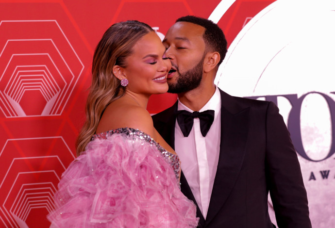 ג'ון לג'נד וכריסי טיגן (צילום:  REUTERS/Andrew Kelly)