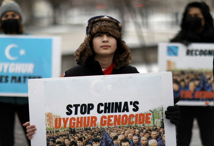 מחאת המיעוט המוסלמי בסין  (צילום:  רויטרס)
