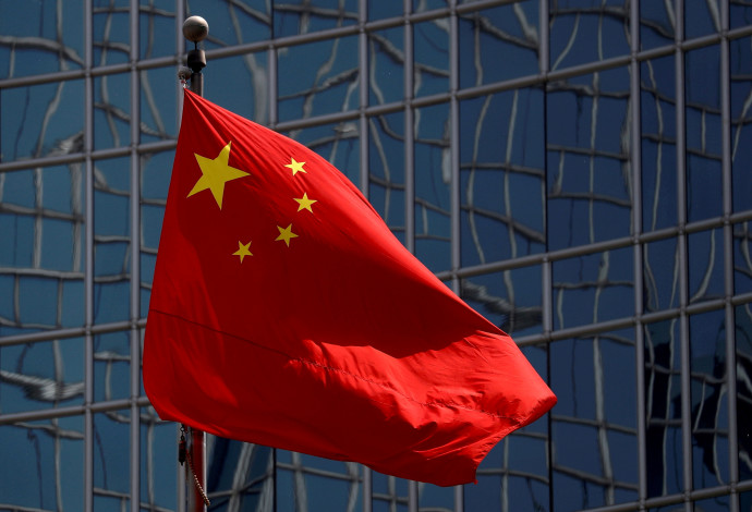 דגל סין (צילום:  REUTERS/Thomas Peter/File Photo)