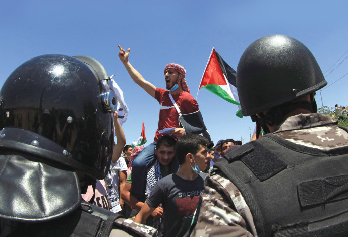 הפגנה אנטי-ישראלית בעיירה כראמה (צילום:  AFP via Getty Images)