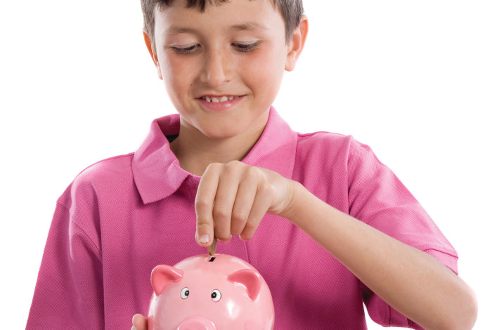 ילד חוסך כסף (צילום:  אינגאימג')