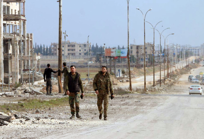 חיילי צבא סוריה (צילום:  SANA/Handout via REUTERS)