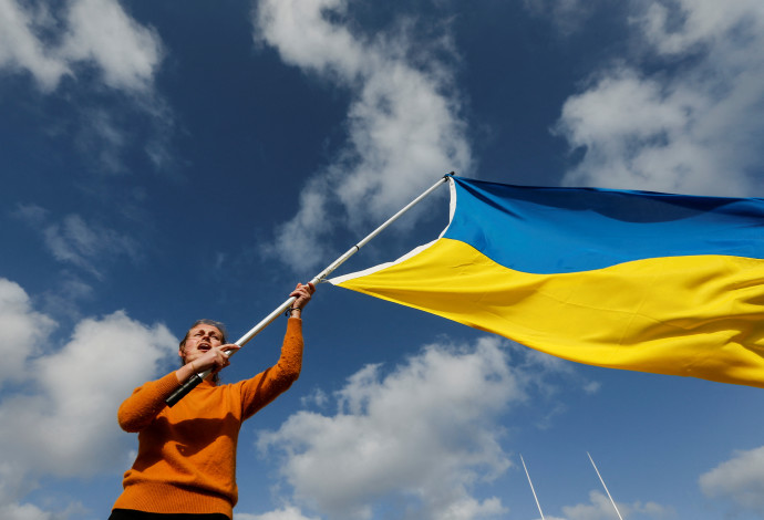 הפגנת תמיכה באוקראינה (צילום:  REUTERS/Darrin Zammit Lupi)