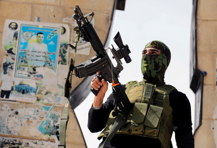 פעיל טרור בג'נין (צילום:  REUTERS/Raneen Sawafta)