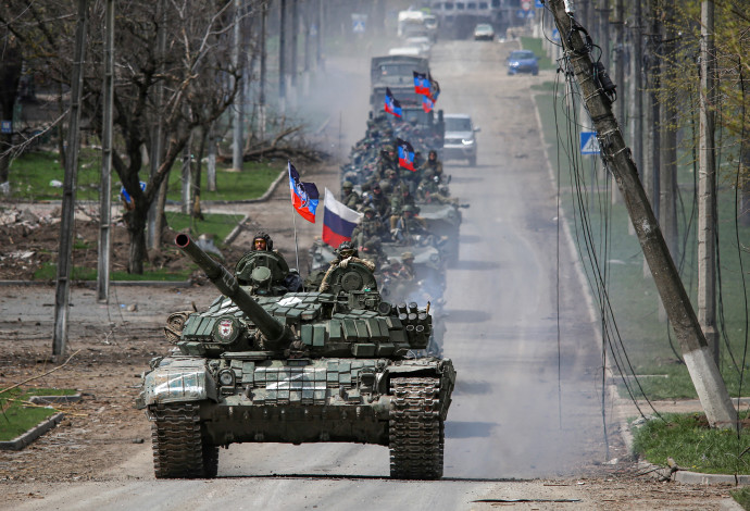 כוחות רוסים באוקראינה (צילום:  REUTERS/Chingis Kondarov)