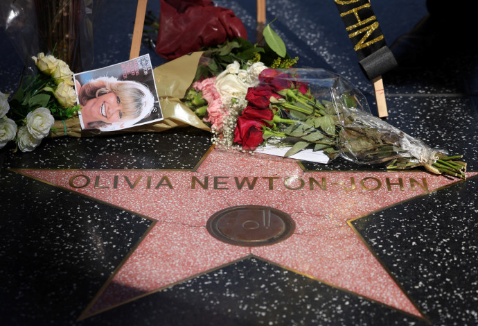 כוכב על שמה של אוליביה ניוטון ג'ון בשדרת הכוכבים בלוס אנג'לס (צילום:  REUTERS/Mario Anzuoni)
