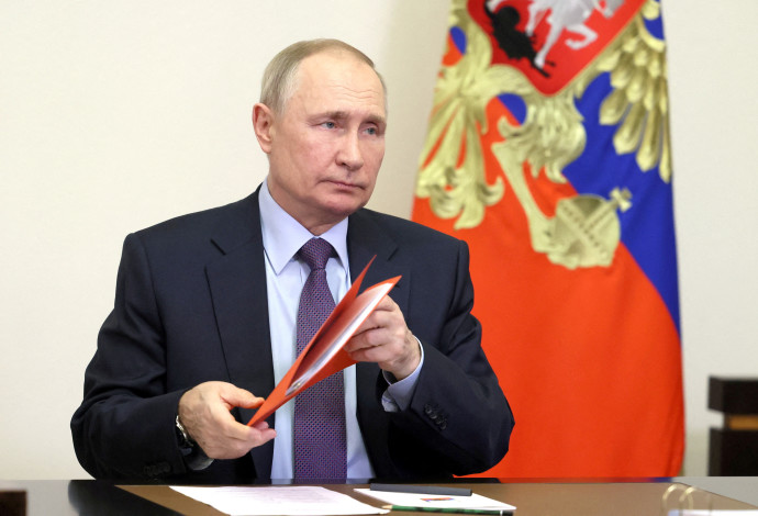 נשיא רוסיה ולדימיר פוטין  (צילום:  Sputnik Mikhail Metzel Pool via)