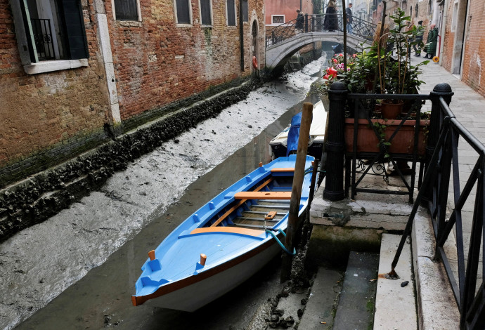בצורת בוונציה (צילום:  REUTERS/Manuel Silvestri)