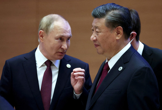 נשיא רוסיה ולדימיר פוטין ונשיא סין שי ג'ינפינג  (צילום:  Sputnik/Sergey Bobylev/Pool VIA REUTERS)