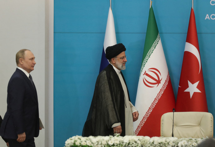 ולדימיר פוטין ואבראהים ראיסי (צילום:  Majid Asgaripour/WANA (West Asia News Agency) via REUTERS)