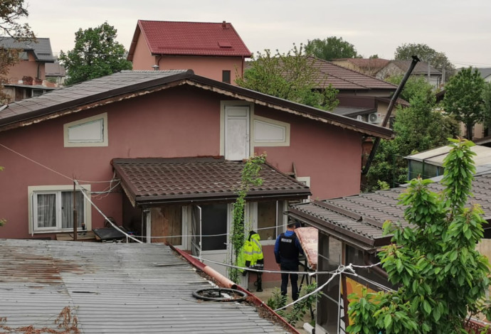 הבית ברומניה בו התבצר האב עם בתו (צילום:  דוברות המשטרה)