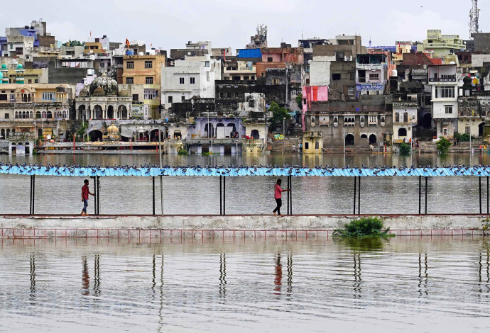 שיטפונות בהודו (צילום:  AFP via Getty Images)