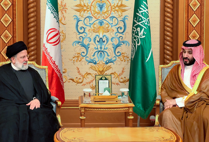 מוחמד בן סלמאן ונשיא איראן ראיסי (צילום:  Iran's Presidency/WANA (West Asia News Agency)/Handout via REUTERS)