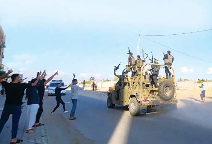 פעילי חמאס  ב-7 באוקטובר (צילום:  עטיה מוחמד פלאש 90)