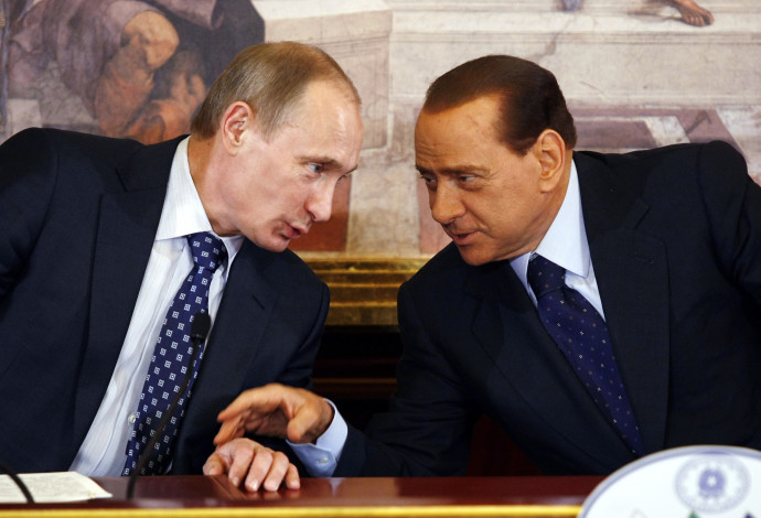 פוטין וראש ממשלת איטליה לשעבר (צילום:  רויטרס)