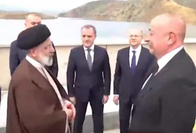 נשיא איראן ונשיא אזרבייג'ן טרם העלייה של ראיסי למסוק (צילום:  רשתות חברתיות באיראן)