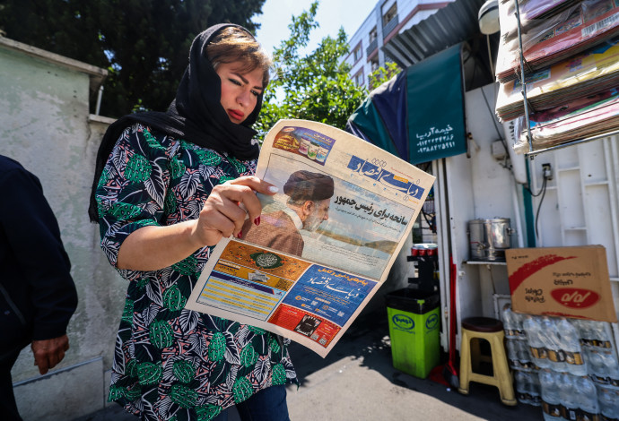 איראן ביום שאחרי מות ראיסי  (צילום:  ATTA KENARE / Getty Images)