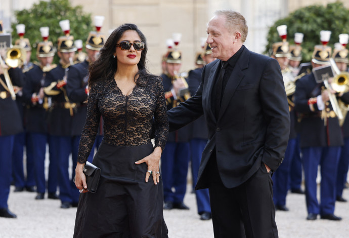 סלמה הייק ובעלה (צילום:  LUDOVIC MARIN/AFP via Getty Images)