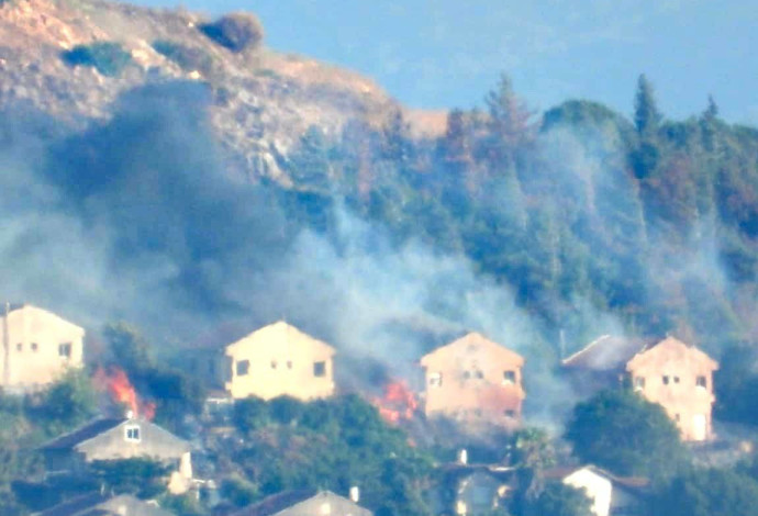 מטולה עולה באש (צילום:  רשתות ערביות)