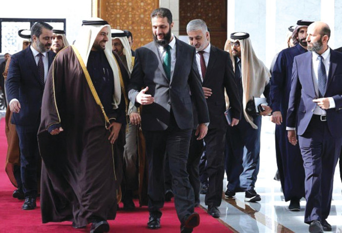 אל ג'וליאני עם השר הקטארי (צילום:  Qatar Foreign)