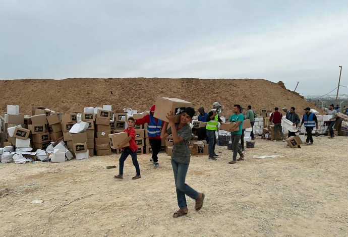 חלוקת הסיוע ההומניטרי בעזה (צילום:  ללא קרדיט)
