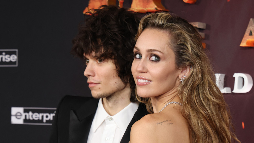 מיילי סיירוס ומקס מורנדו (צילום:  VALERIE MACON / AFP via Getty Images)