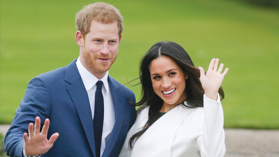 הנסיך הארי ובת זוגו מייגן מרקל (צילום: AFP)